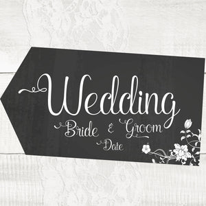Wedding Pointer sign in Black and white chalkboard design with delicate white flowers, personalise with Bride and Grooms names and their wedding date. Comes in either left pointing, right pointing or be safe and go for double sided