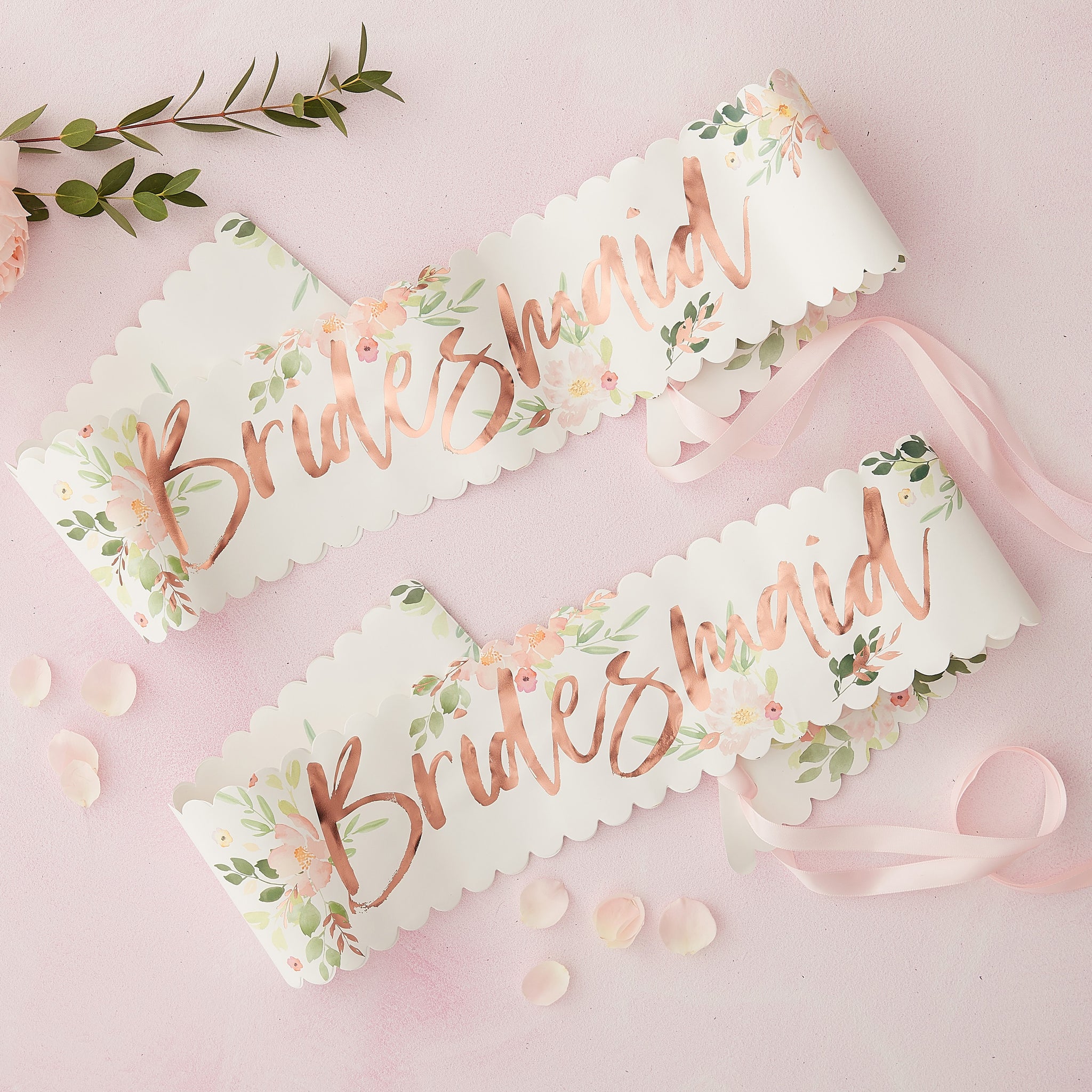 Floral Bridesmaid sash, with rose gold foiling , floral design and scalloped edges ties with a pink ribbon. Sash is made from paper. Would suit floral, Rose Gold, or botanical themed bridal shower or hen party decor