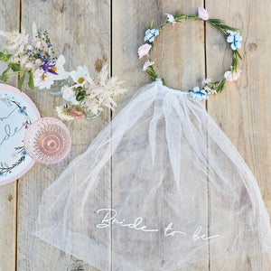 Floral Bride-to-Be Veil and Flower Crown for a fun finishing touch to your hen party or bridal shower attire. Flowers are pale pink and blue and the veil has "Bride to be" written in script font
