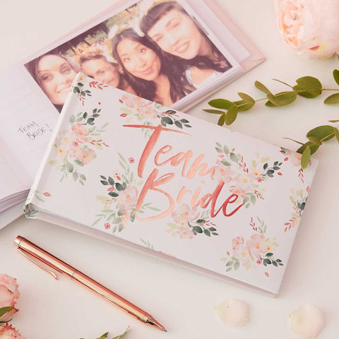 Floral Photo album with the words Team Bride in rose gold foiling on front cover. Perfect for storing photos from your hen party or bridal shower or both, album holds 50 pictures
