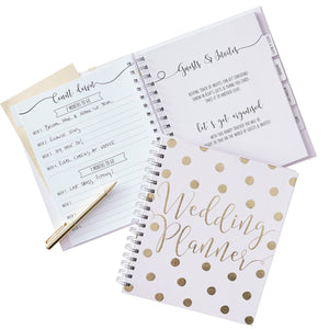 Pale pink and Gold foiled polka dot spiral bound wedding planner book, containing different sections for guest lists, budgets etc. all separated by dividers