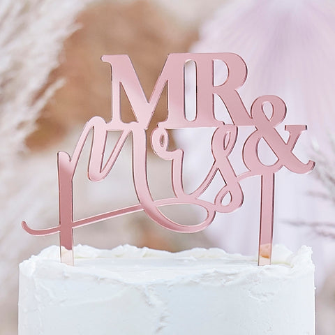 This Rose Gold Acrylic cake topper uses 2 font styles together, "Mr &" is in a non-Script font and "Mrs" is in an elegant script-type font