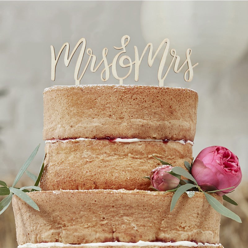 Same Sex Wedding Cake Topper in rustic wood, wording reads Mrs & Mrs in a beautiful script font style.