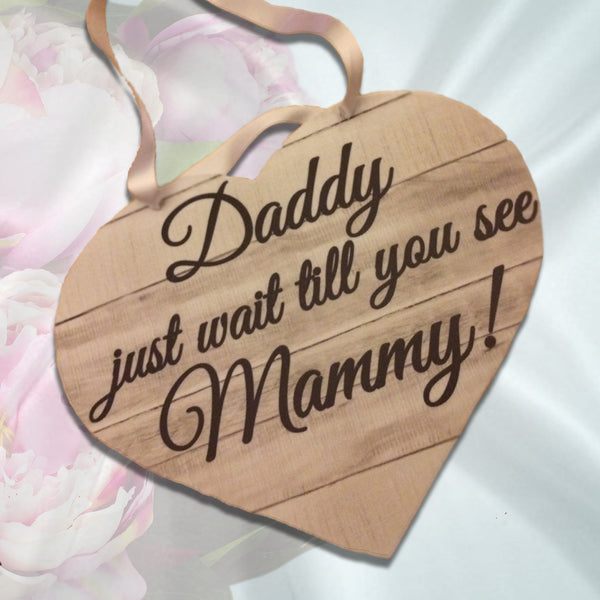 Daddy just wait till you see Mammy pageboy sign