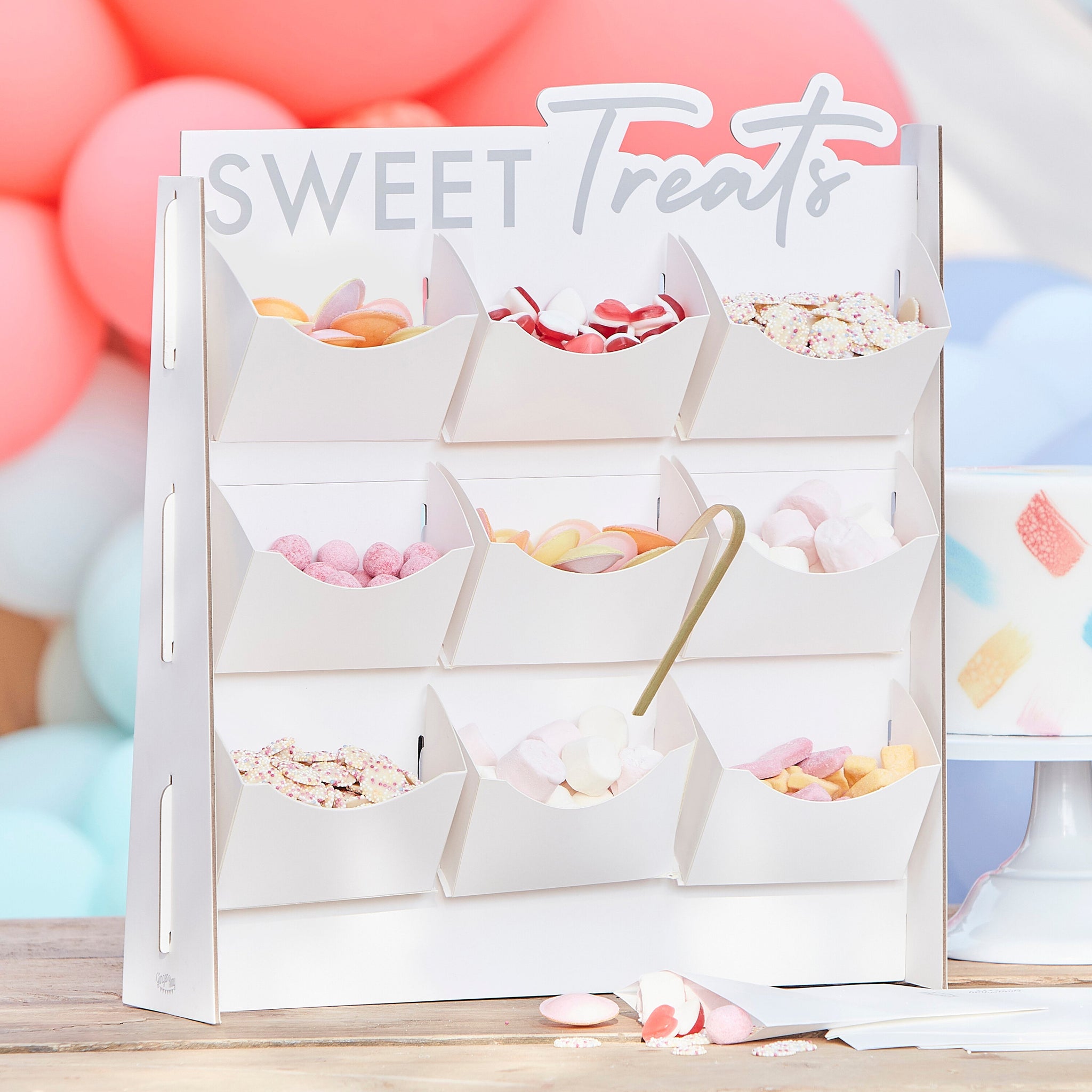 Sweet Treat Stand in heavy card with 9 pockets for small sweets pack includes 10 treat bags, a great addition to your treat table at any occasion.